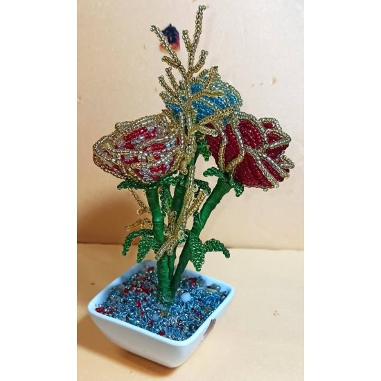 Sand bead roses, different colors. Made of sand beads on green wire, in a porcelain bowl. Height 16-18 cm.