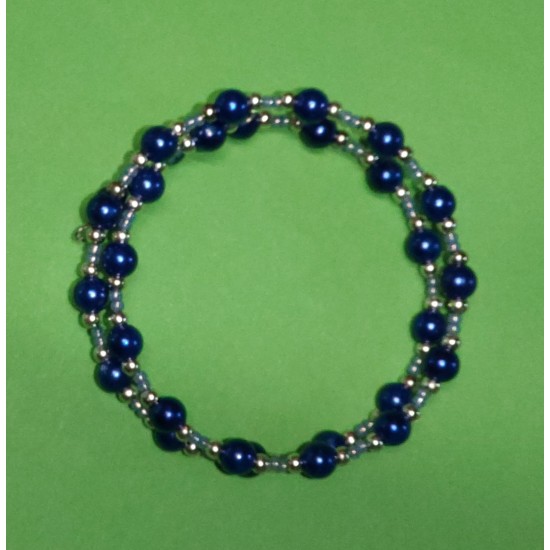 Silver bead bracelet, toho beads, navy glass pearls. The bracelets are made by hand on memory wire. One size room.