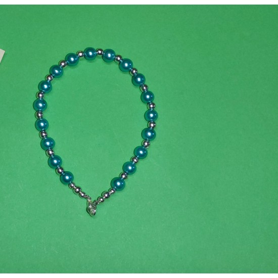 Blue glass beads and silver beads. The bracelet is handmade on silicone wire with lobster clasp. 