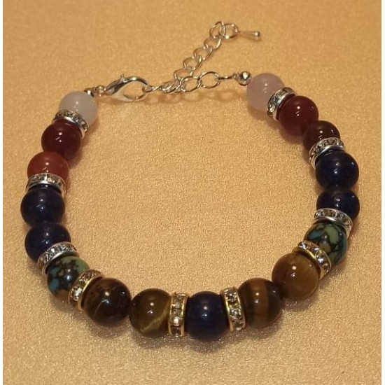 Bracelet 17 + 5cm silver extension, made of beads, amethyst, howlite, synthetic emerald, tiger eyes, resin amber, agate, lapis lazuli, quartz and silver spacers with colored crystals (rhinestone). Made of silicone wire with silver-plated lobster clasp.