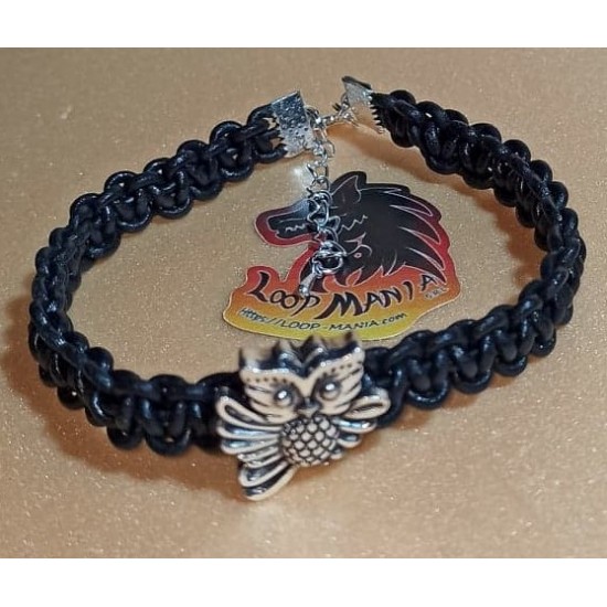 Leather braided bracelet with metal beads. Woven from natural leather 3 threads of 2 mm with Tibetan silver owl bead. Size 24.8 and 23 cm plus silver plated extension 5 cm with silver plated lobster locks.