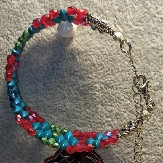 Bracelet made of glass and acrylic beads, on silicone wire, with stainless steel accessories, with stainless steel lobster clasps with a 5 cm extension..