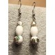 Earrings made of porcelain beads and cloisonne with spacers and stainless steel plates. 