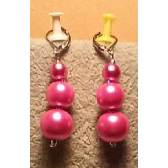 Glass and acrylic pearl earrings with stainless steel earrings.