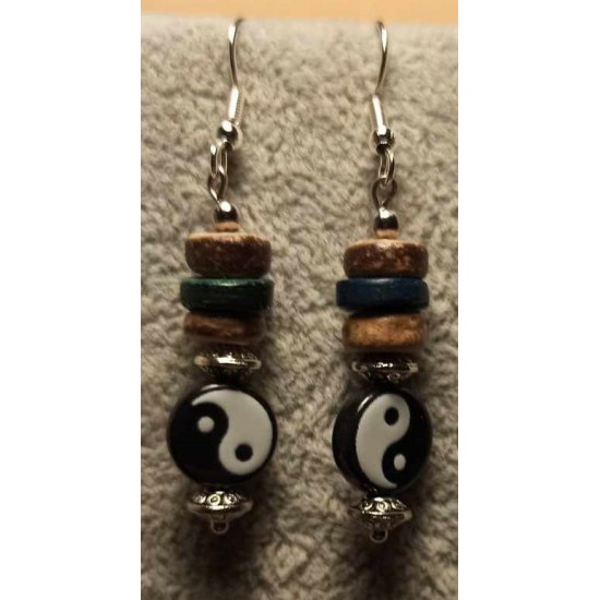 Coconut bead earrings with ying yang acrylic beads with spacers and stainless steel earrings.