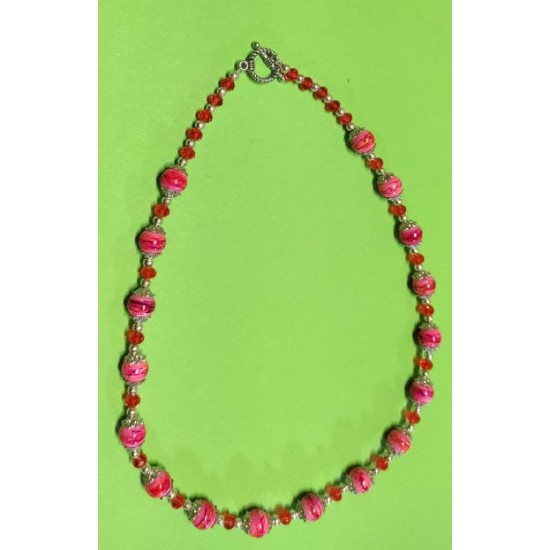 Necklace about 51 cm. Faceted orange glass crystals, "Glossy" glass beads, pink, silver balls and Tibetan silver caps.