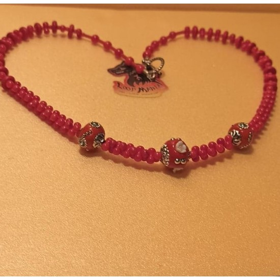 Necklace about 52 cm. Red coral beads, hourglass, Bulgarian coral, Tibetan spacer. The necklace is handmade on silicone wire with antique Tibetan silver toggle clasps.
