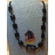 Necklace made of onyx beads of different sizes, onyx spheres, flat square onyx, etc. Made on silicone wire with silver plated toggle locks.