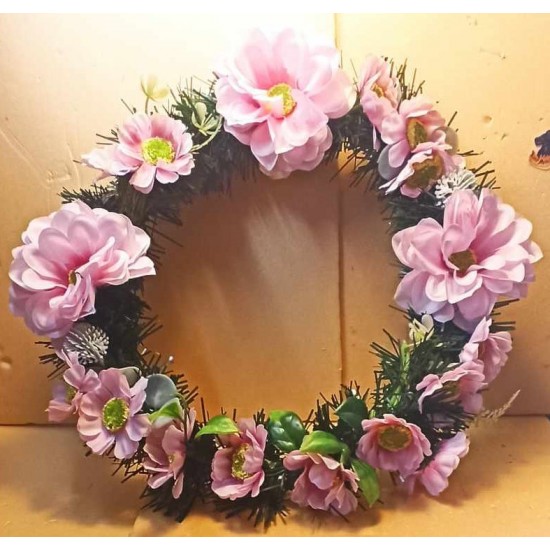 Fir wreath with artificial flowers, sunflower and thistle.
