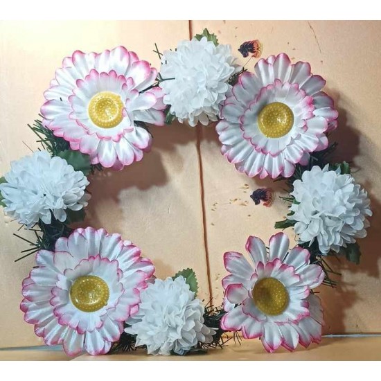 Fir wreath with artificial flowers, small white gerbera with pink and white chrysanthemums.