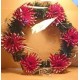 Artificial fir wreath with plastic flowers, dahlias 7 cm, diameter of the wreath 25 cm