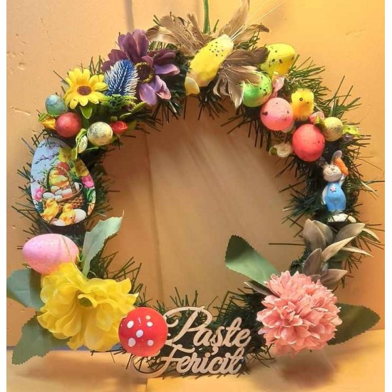 Easter wreath made of fir and artificial flowers with polystyrene eggs, poisson and bunny,