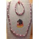 Set: necklace--bracelet red and pink and yellow. Necklace and bracelet, made of two rows of acrylic and glass beads with accessories plated with stainless steel metal beads,