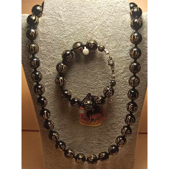 Set: necklace--bracelet. Necklace and bracelet made of black acrylic beads with Chinese inscriptions and glass beads, on silicone wire, with silver-plated accessories with Tibetan silver toggle clasps. 