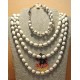 Set: necklace--bracelet with porcelain beads. Necklace and bracelet made of porcelain beads and stainless steel metal beads